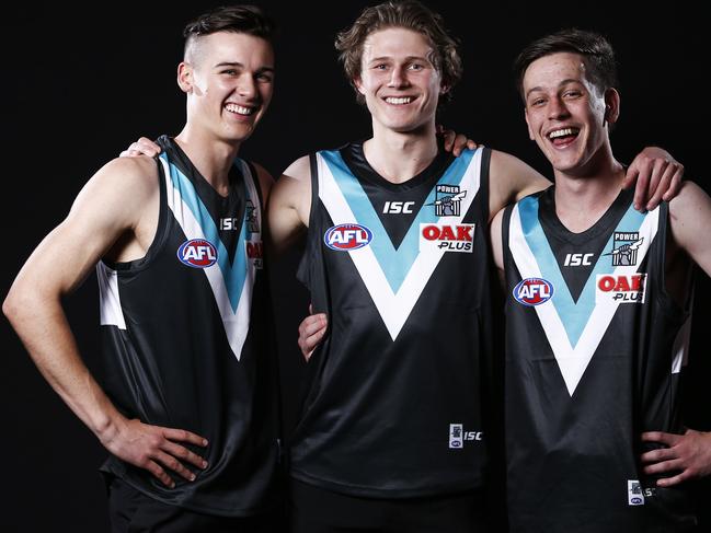 (L-R) Connor Rozee, Xavier Duursma and Zak Butters of the Power pose for a photograph during the 2018 AFL Draft at Marvel Stadium in Melbourne, Australia, Thursday, November 22, 2018. (AAP Image/Daniel Pockett) NO ARCHIVING, EDITORIAL USE ONLY