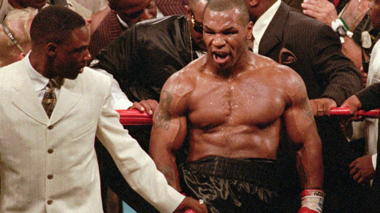 Mike Tyson pictured in 1997 after biting Evander Holyfield's ear. (AP)