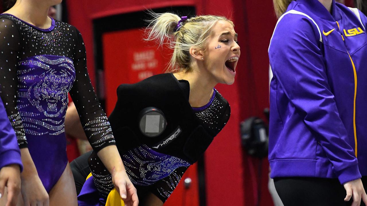 Olivia Dunne of LSU and her teammates cheer during a PAC-12 meet against Utah. (Photo by Alex Goodlett / GETTY IMAGES NORTH AMERICA / Getty Images via AFP)