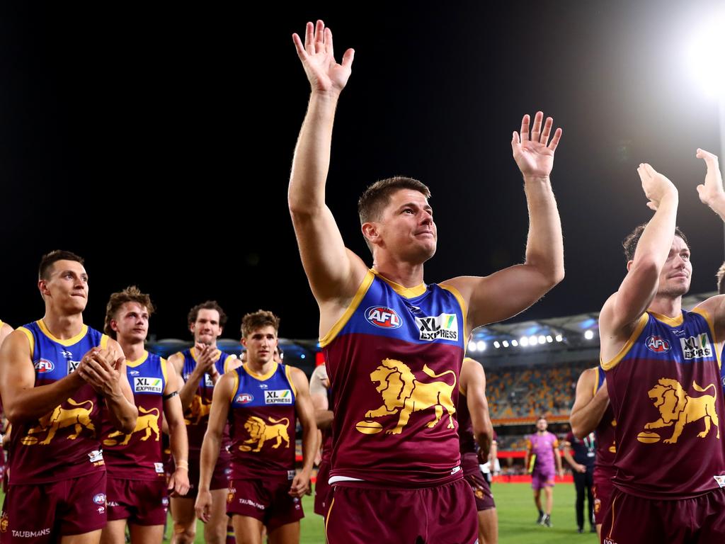 Dayne Zorko and his teammates salute Brisbane’s fans after the Lions’ win over Port Adelaide. Picture: Chris Hyde/Getty Images