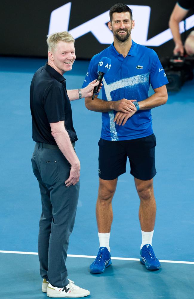 Novak Djokovic speaks with Jim Courier in interview screened on Eurosport. Photo by Andy Cheung/Getty Images