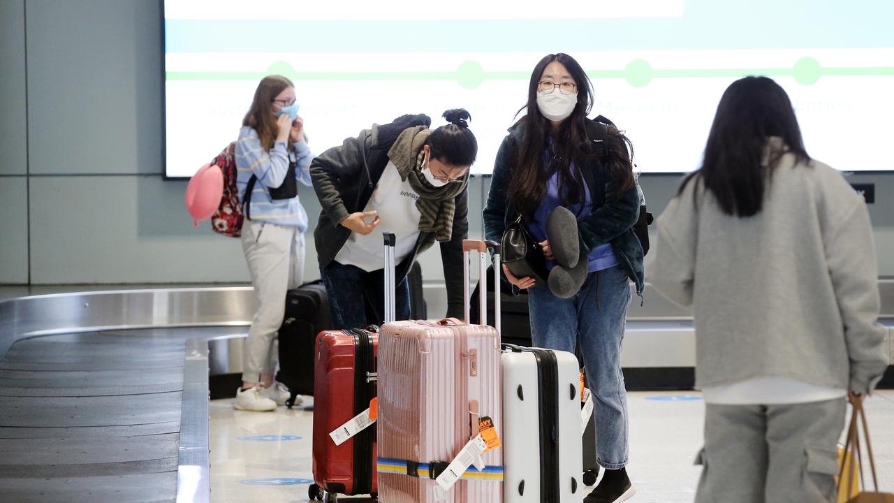 Passengers from Melbourne arrive at Sydney Airport ahead of the border lockdown. Picture: Richard Dobson