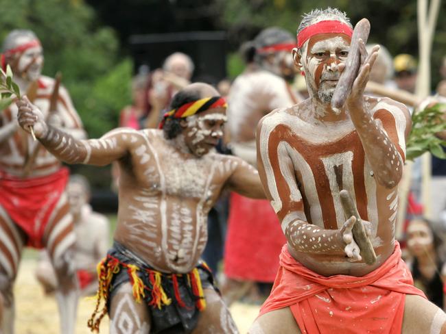 Members of the Aboriginal community perform a traditional smoking ritual in Sydney's Botanical Gardens on Australia Day in 2009. Picture: AP/Rick Rycroft