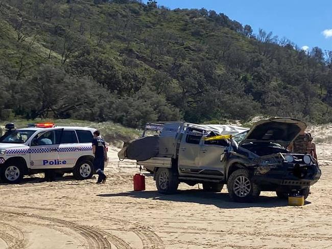 SOCIAL MEDIA IMAGE DISCUSS USE WITH YOUR EDITOR - A picture uploaded to Double Island Point Facebook page shows police at the scene of a serious rollover at Teewah Beach on Sunday.