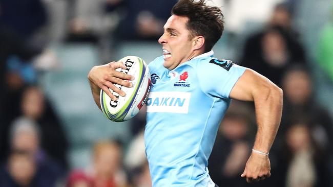 SYDNEY, AUSTRALIA - JULY 07: Nick Phipps of the Waratahs breaks away to score a try during the round 18 Super Rugby match between the Waratahs and the Sunwolves at Allianz Stadium on July 7, 2018 in Sydney, Australia. (Photo by Mark Kolbe/Getty Images)