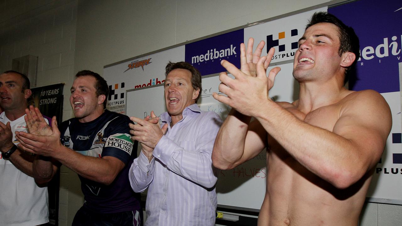 Bellamy belting out the team song with Clint Newton and Cooper Cronk.