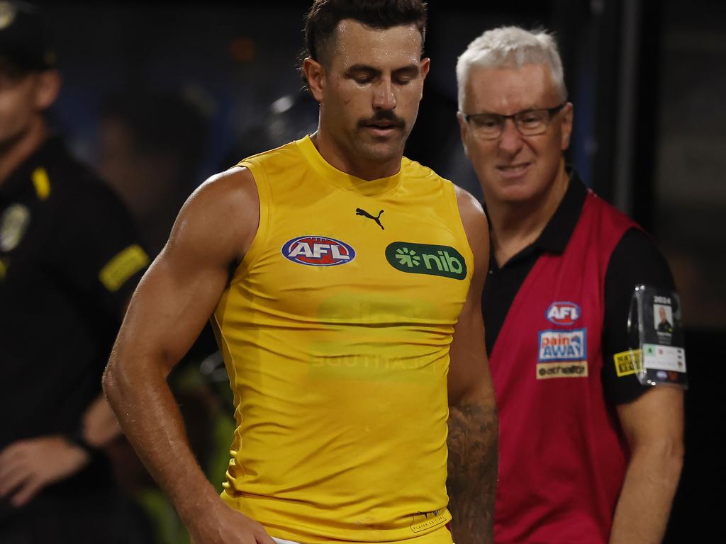 A despondent Jack Graham heads to the bench late in the game after being injured. Picture: Michael Klein