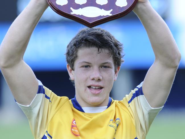 Toukley captain Jack Cogger holds up the shield after winning the Under 14/1s grand final in 2011. Picture: Mark Scott