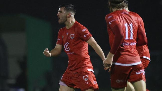 Lachlan Weier celebrates a goal for Hume City.