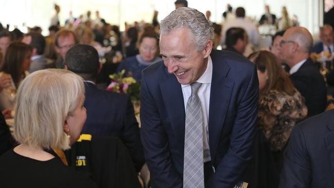 Telstra CEO Andrew Penn speaks with Richman chairman Peggy O’Neal. Picture: Getty