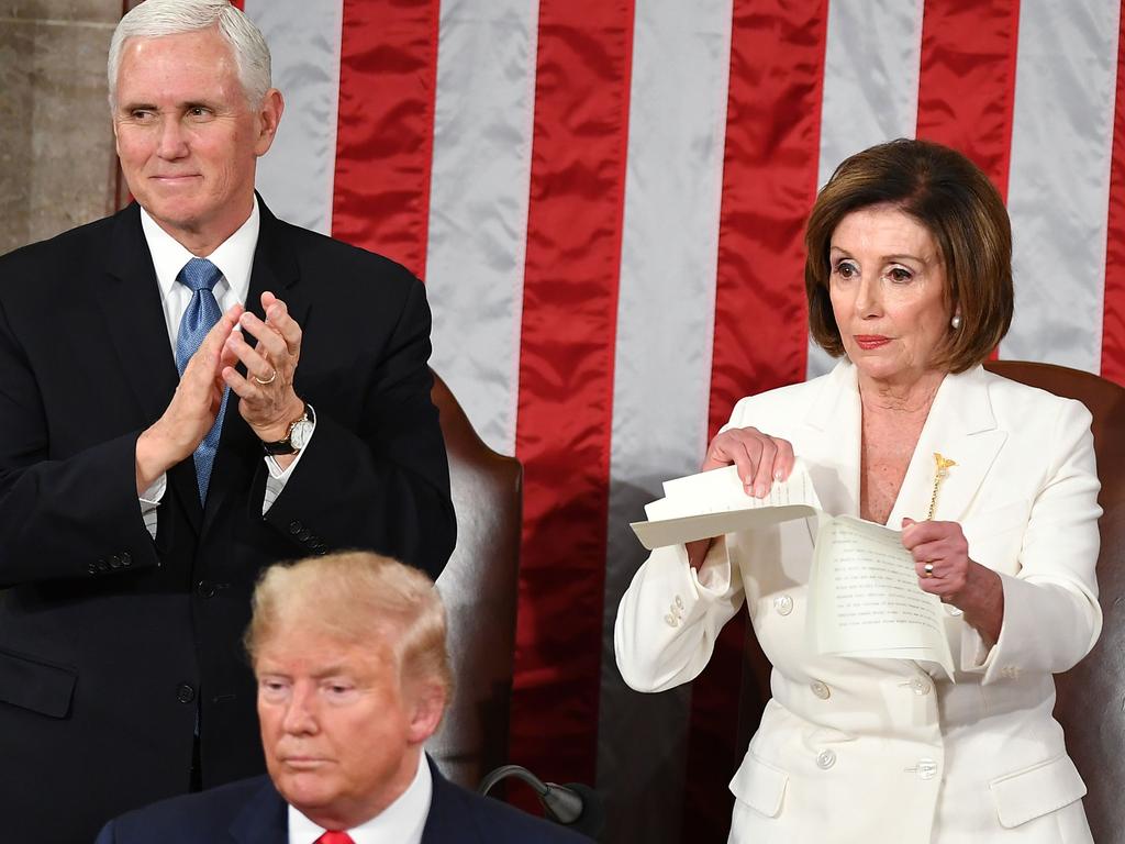 Nancy Pelosi ripping up a copy of President Trump’s speech. Picture: Mandel Ngan/AFP