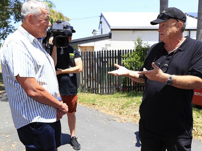 Independent candidate for Caloundra Mike Jessop speaking with former Labor member Don Rolls. Picture: Adam Head