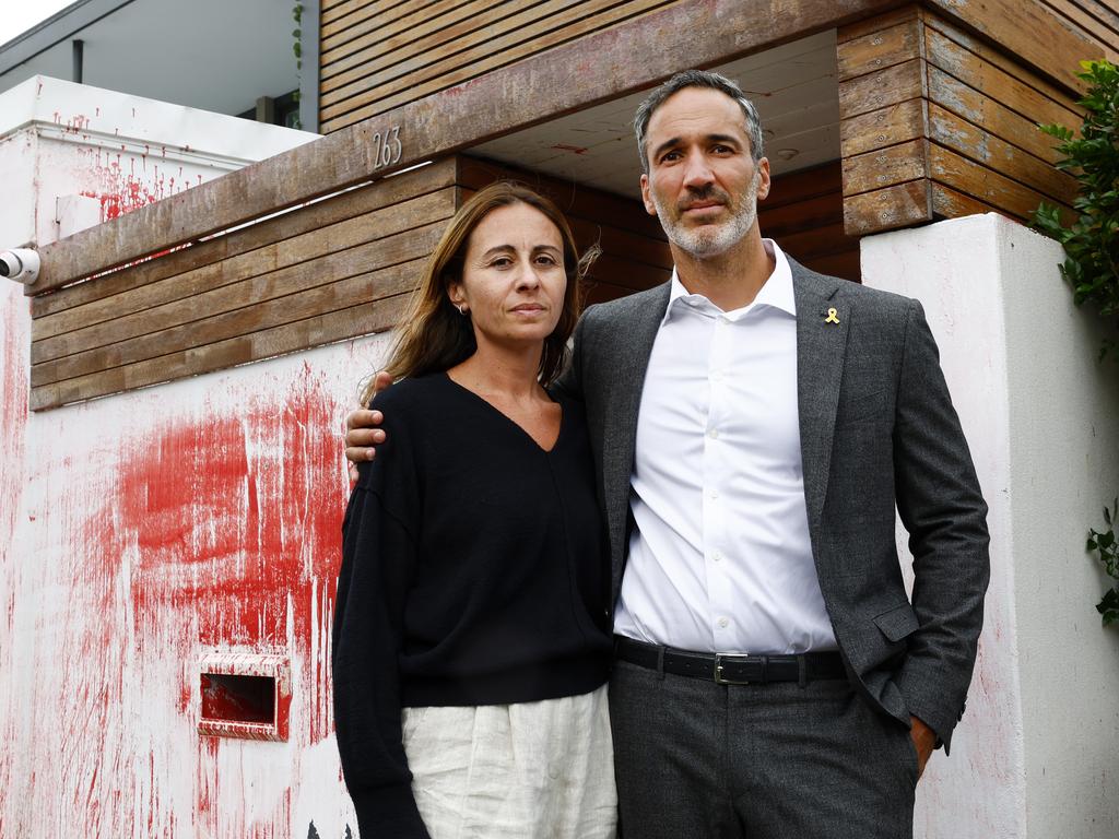 Alex Ryvchin with his wife Vicki outside their old home in Dover Heights, which was targeted in an anti-Semitic attack. Picture: Jonathan Ng