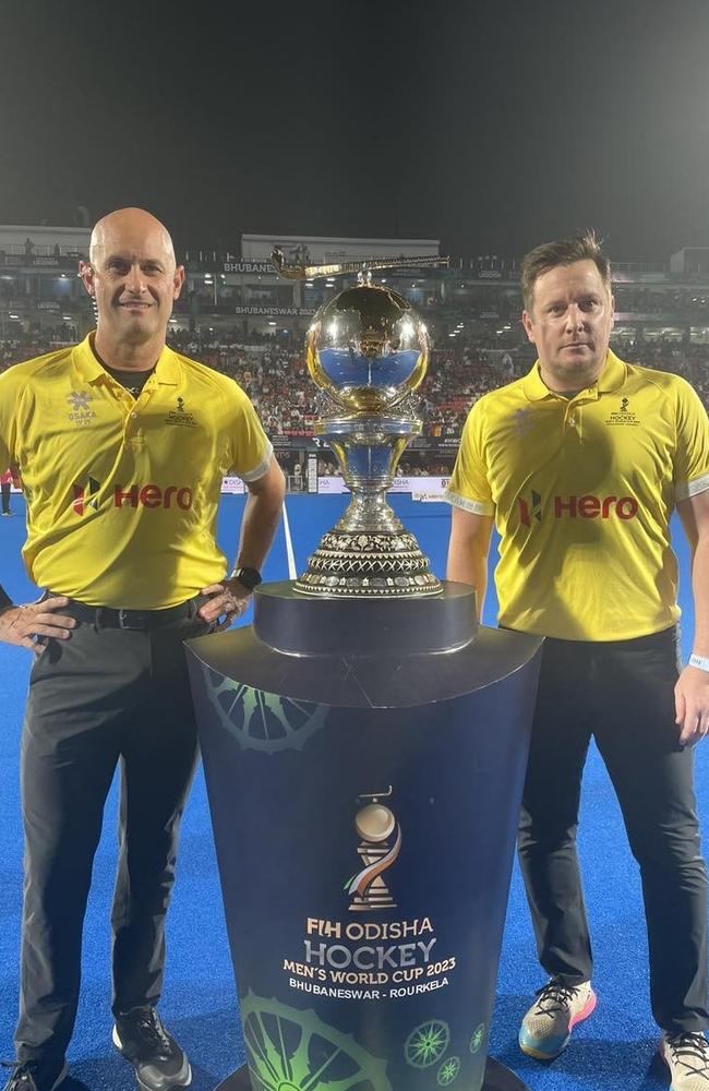 Steve Rogers (left) with fellow umpire Jakub Mejlik of Czechia before the 2023 FIH Men's World Cup final, Bhubaneswar, India.