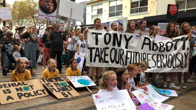 A climate change protest was happening at the same time outside Mr Abbott’s office in Manly. Picture: Julie Cross.