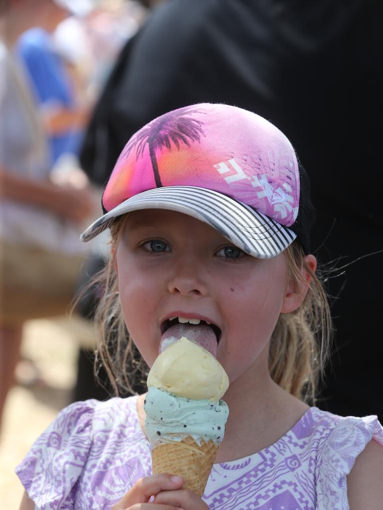 Clare, 7, enjoys an ice cream. Picture: Mike Dugdale