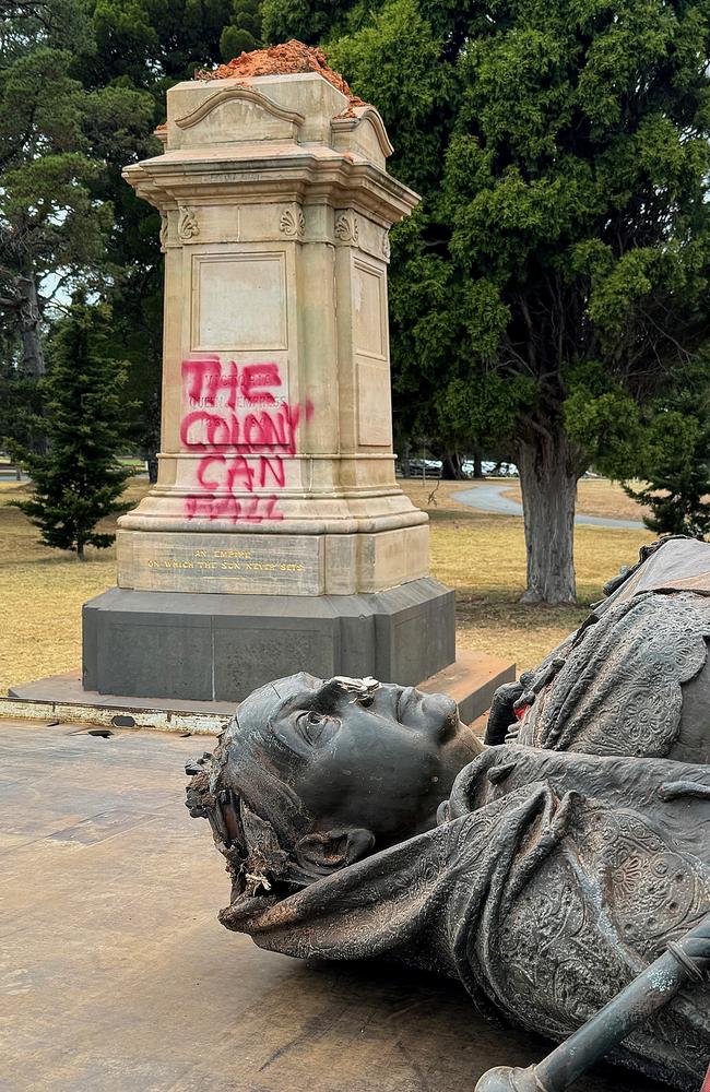 The damaged Queen Victoria bronze statue was taken away by crane. Picture: Alison Wynd.