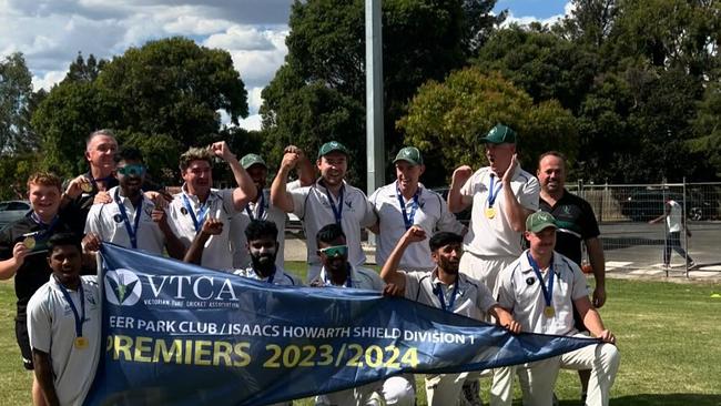 Airport West St Christopher's celebrate their premiership.