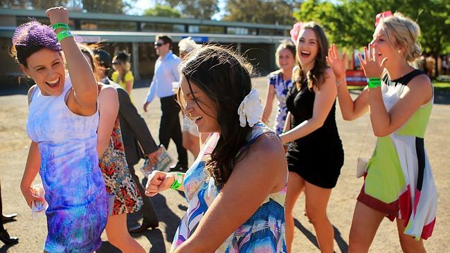 A group of women leave the Bendigo track in good spirits Cup day. Picture: Mark Evans