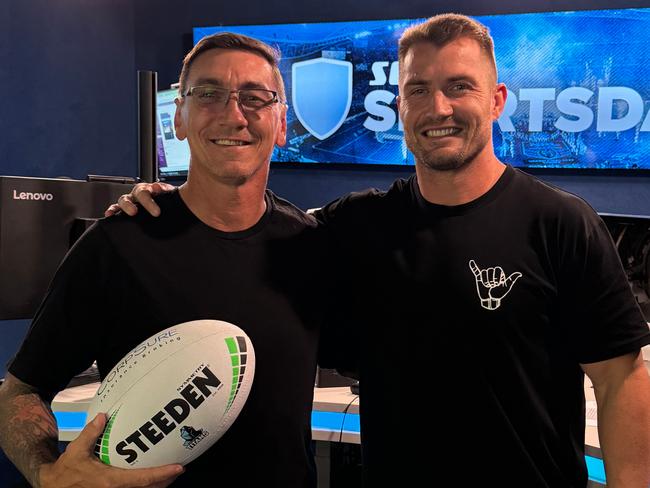 Gold Coast Titans legend Mat Rogers, pictured alongside Kieran Foran. Picture: Gold Coast Titans