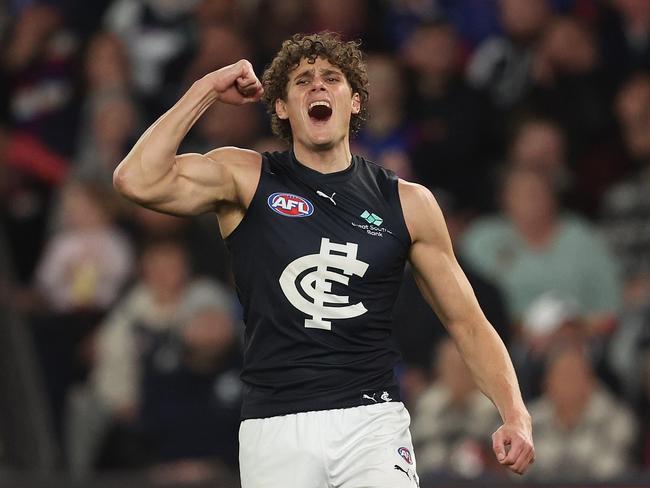 MELBOURNE, AUSTRALIA – JULY 13: Charlie Curnow of the Blues celebrates after scoring a goal during the round 18 AFL match between Western Bulldogs and Carlton Blues at Marvel Stadium, on July 13, 2024, in Melbourne, Australia. (Photo by Robert Cianflone/Getty Images)