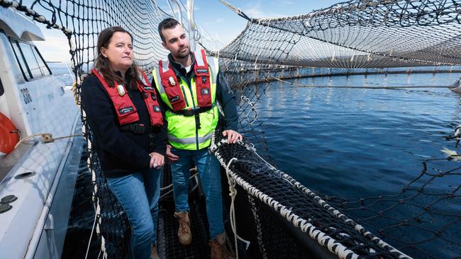 Salmon farmers Depha Miedecke and Tom Mountney warn they could go bust if evicted from Macquarie Harbour. Picture: Peter Mathew
