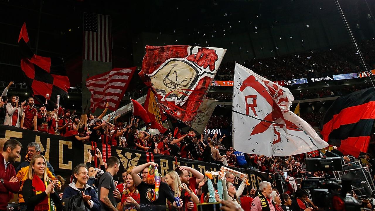 Atlanta United fans cheer. Kevin C. Cox/Getty Images/AFP