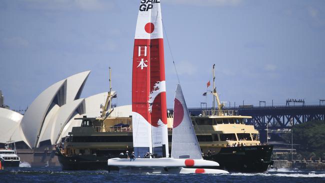 The Japan team sail through the course on Sydney Harbour. Picture: Dylan Robinson