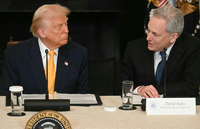 US President Donald Trump listens to White House AI and Crypto Czar David Sacks speak during a White House Crypto Summit