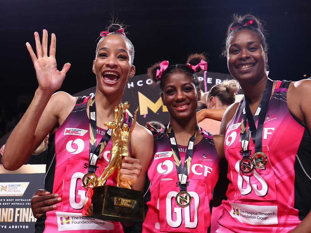 ADELAIDE, AUSTRALIA - AUGUST 03: (L-R) Shamera Sterling-Humphrey, Latanya Wilson and Romelda Aiken-George of the Thunderbirds celebrate victory in the Super Netball Grand Final match between Adelaide Thunderbirds and Melbourne Vixens at Adelaide Entertainment Centre on August 03, 2024 in Adelaide, Australia. (Photo by Graham Denholm/Getty Images)