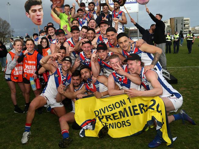 West Preston-Lakeside celebrates with the flag and premiership cup. Picture: Hamish Blair