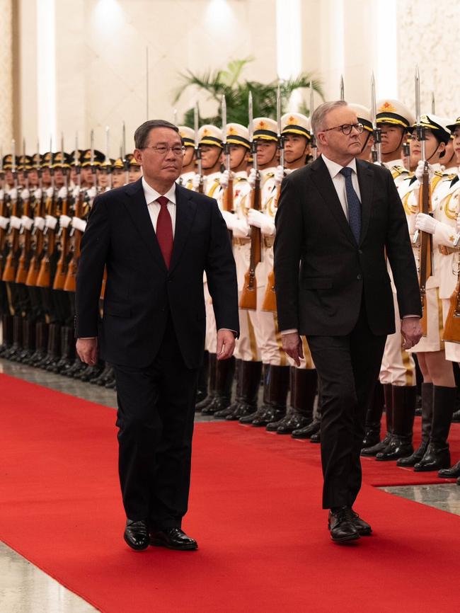 Anthony Albanese inspects a PLA guard of honour with Chinese Premier Li Qiang in the Great Hall of the People during his visit to Beijing in 2023<span>. Picture: PMO</span>