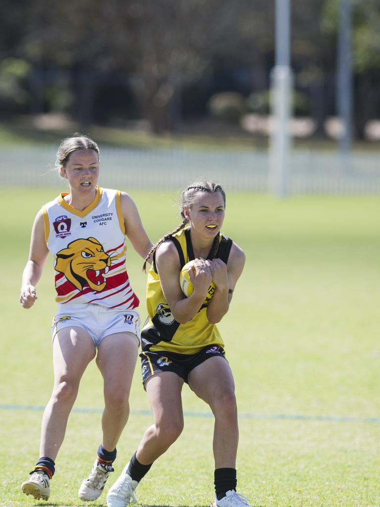 Lara Paget takes a mark for Toowoomba Tigers against University Cougars in AFL Darling Downs Toowoomba Toyota Cup senior women grand final at Rockville Park, Saturday, September 2, 2023. Picture: Kevin Farmer