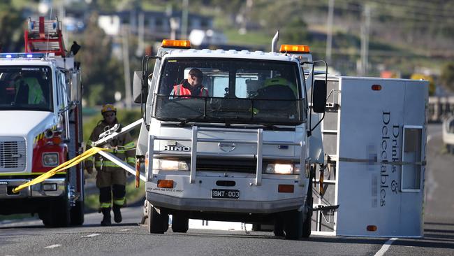 A caravan was blown over by high winds on the Bridgewater Bridge late Sunday afternoon. Picture: NIKKI DAVIS-JONES