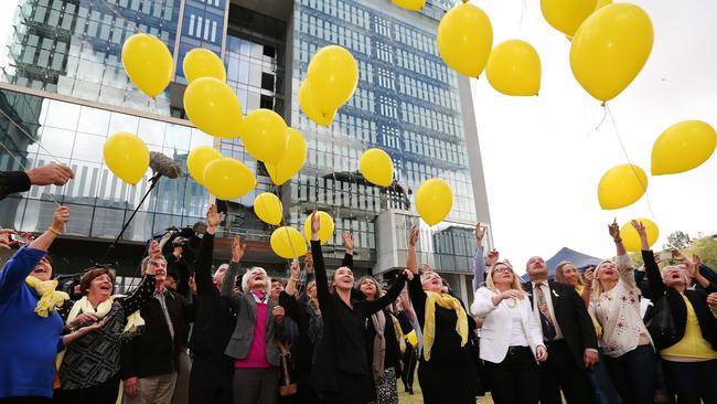 Supporters release yellow balloons after the verdict in the Baden-Clay murder trial. Picture: Jack Tran