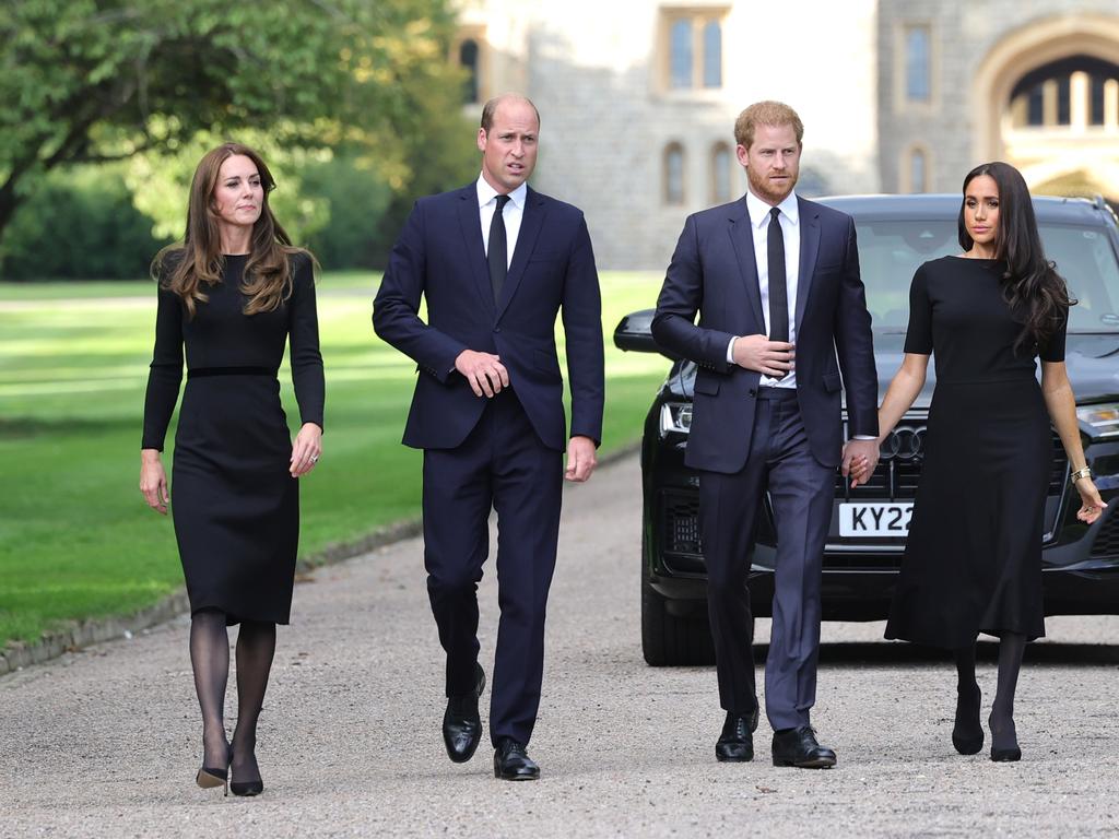 WINDSOR, ENGLAND - SEPTEMBER 10: Catherine, Princess of Wales, Prince William, Prince of Wales, Prince Harry, Duke of Sussex, and Meghan, Duchess of Sussex on the long Walk at Windsor Castle on September 10, 2022 in Windsor, England. Crowds have gathered and tributes left at the gates of Windsor Castle to Queen Elizabeth II, who died at Balmoral Castle on 8 September, 2022. (Photo by Chris Jackson - WPA Pool/Getty Images)