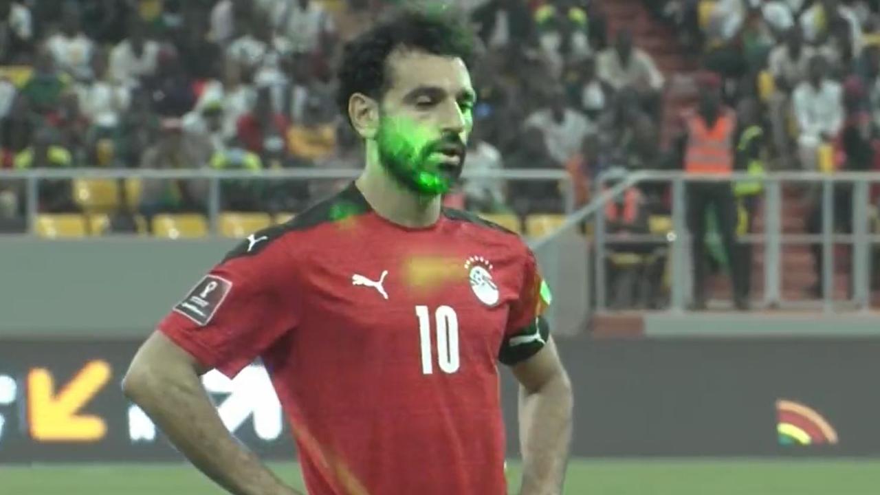 Mohamed Salah blazed his penalty over the bar after being greeted with dozens of lasers. Picture: Supplied