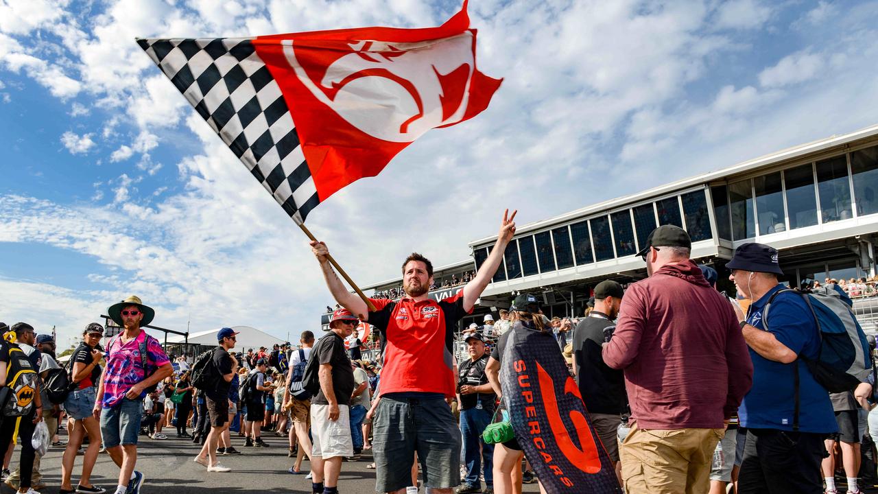 Holden fanatic Justin Hawke flies the flag after the VALO Adelaide 500. Picture: Brenton Edwards