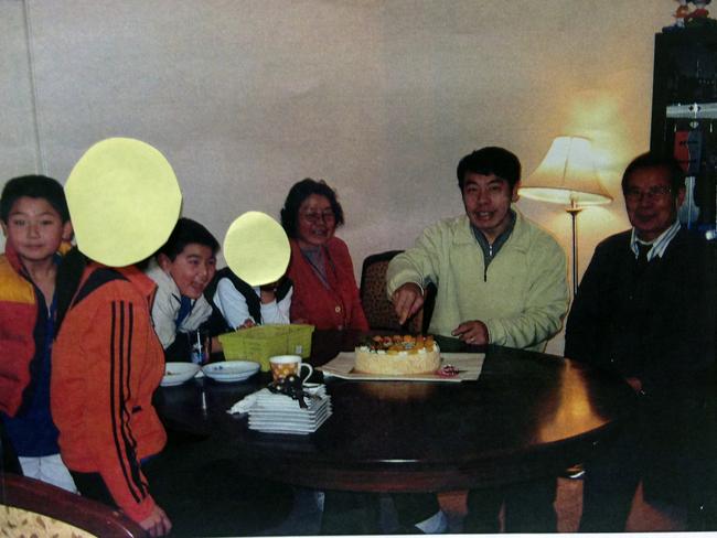 Robert Xie dined with his nephews, Terry Lin, far left, and Henry Lin, second left, at the home of their grandparents, pictured above, the night he murdered them.