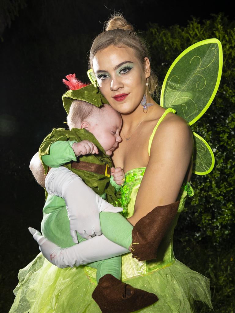 Emily Wilson with her sleeping baby Kyron Noy on Halloween, Monday, October 31, 2022. Picture: Kevin Farmer