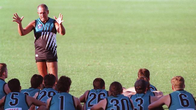 Football coach John Cahill (standing) talking to Port Adelaide Power team at training session. /Port/Adelaide/Football/Club