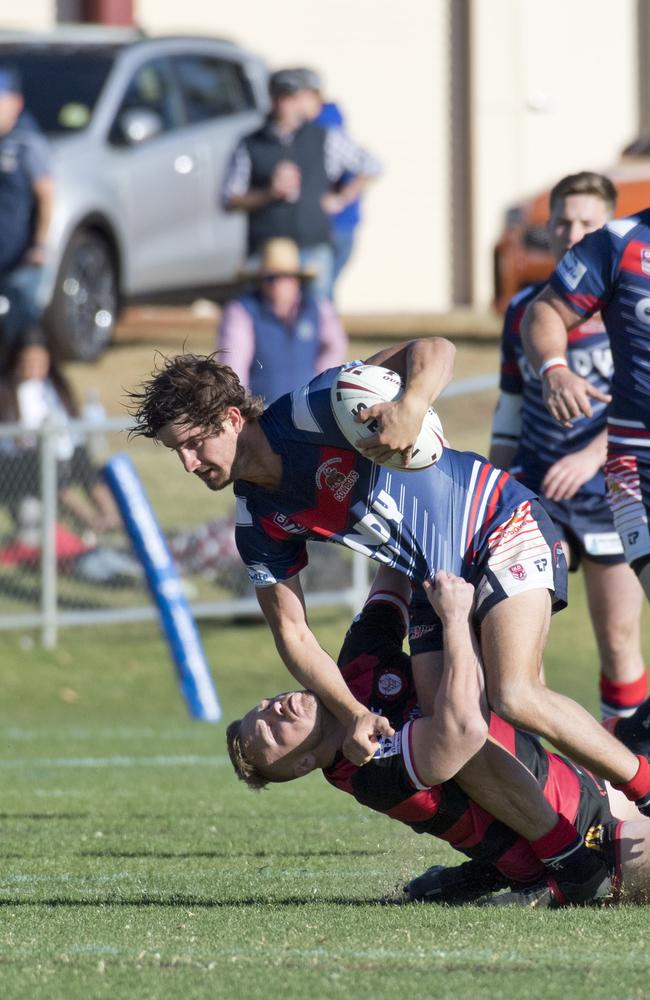 Craig Donn, Warwick tackled by Nathan Bowering, Valleys. TRL grand final, Valleys vs Warwick Cowboys. Sunday, 8th Sep, 2019.