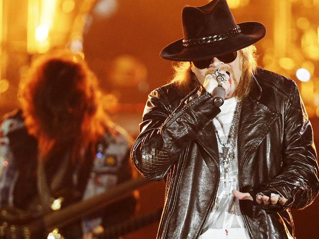 Singer Axl Rose performing with band Guns N' Roses at ANZ Stadium in Homebush, part of the Sydney Telstra 500 entertainment.