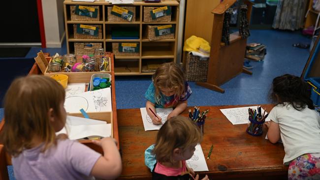 A group of children play at a child care centre.