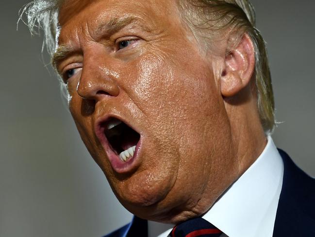 US President Donald Trump gestures after delivering his acceptance speech for the Republican Party nomination for reelection during the final day of the Republican National Convention at the South Lawn of the White House in Washington, DC on August 27, 2020. (Photo by Brendan Smialowski / AFP)