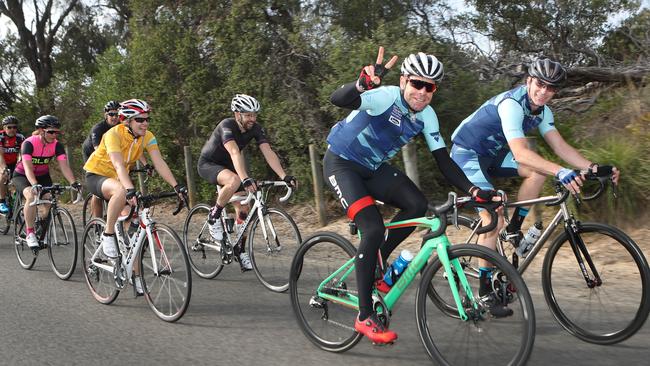 Cadel Evans meets with riders on Beach Rd in Mordialloc in 2017. Picture: David Crosling