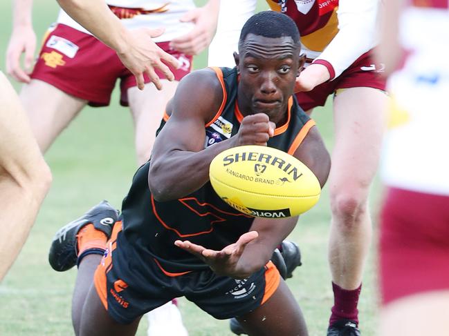 Giants Joseph Bangura (43) handballs. GDFL: Geelong West Giants v East Geelong. Picture: Alan Barber