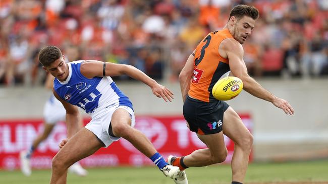 Harry Sheezel and Giants Stephen Coniglio during the Round 1 AFL match between the GWS Giants and North Melbourne at Engie Stadium on March 16, 2024. Photo by Phil Hillyard