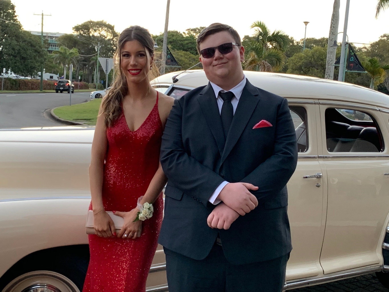 Mascha Bosnjak and Aiden Perrier arriving at the formal in style in a classic car.