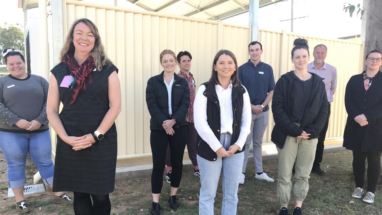 Central West Hospital and Health Service Executive Director of Nursing and Midwifery Services Danielle Causer (front left) and the health service's eight new July intake nurse graduates